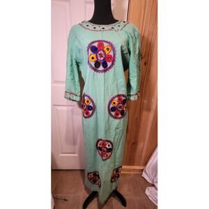 Embroidered homemade dress. Long, beautiful color and design.